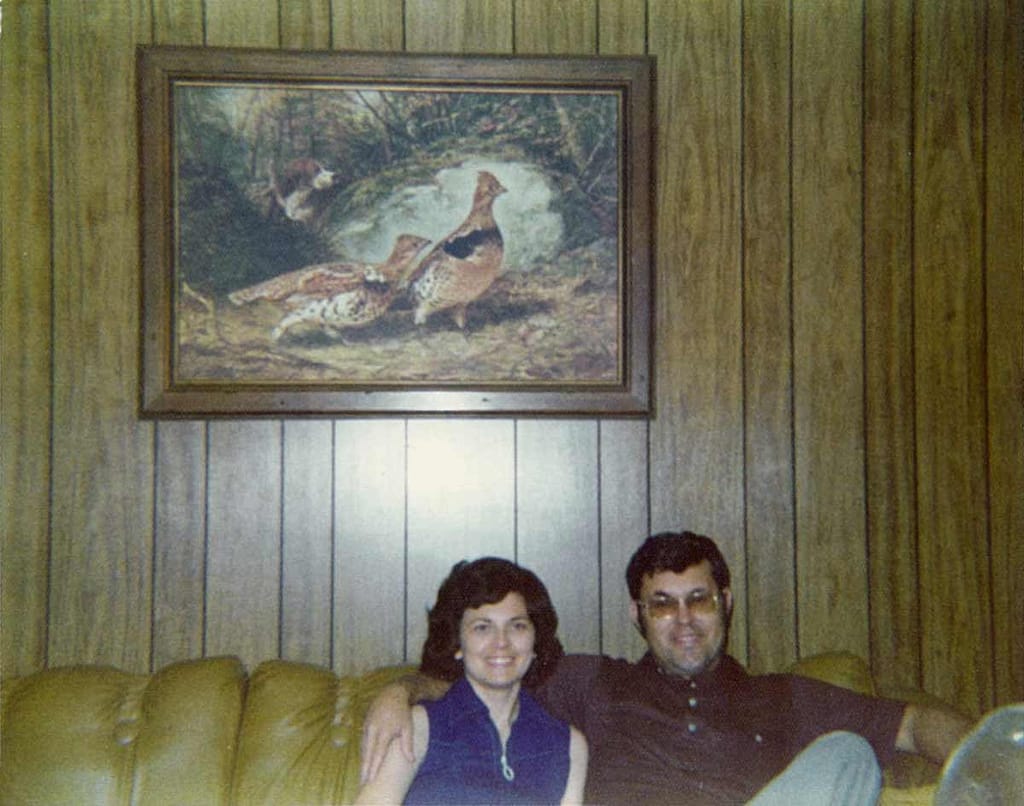 Mr and Mrs Godwin sitting on couch