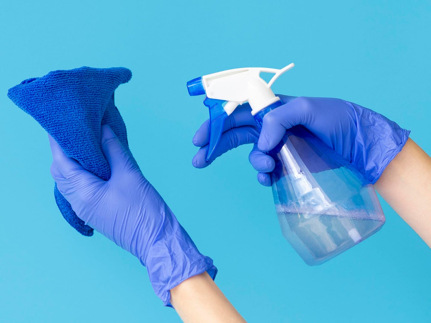 hands-with-surgical-gloves-holding-cloth-ablution